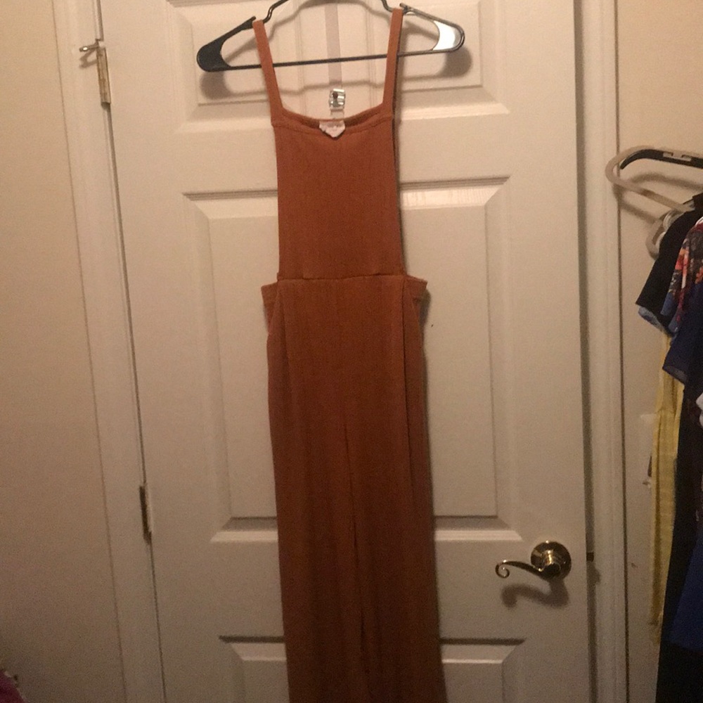 Rust Colored Romper with pockets.  Size M